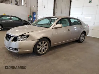2007 Toyota Avalon XL z VIN 4T1BK36B87U243213, wystawiony jako Copart lot #57487135 z przebiegiem 252 264 mil mil oraz Szkoda całkowita • Salvage title. Historia ofert i sprzedaży dostępna na DreamBid. Obrazek 1.