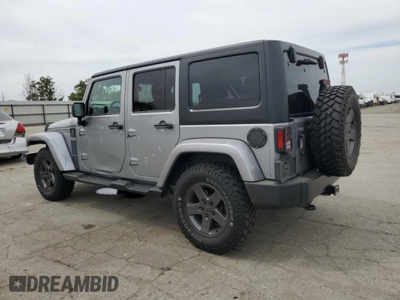 2016 Jeep Wrangler Unlimited Sport z VIN 1C4BJWDG5GL179046, wystawiony jako Copart lot #52989725 z przebiegiem 129 051 mil mil oraz Szkoda całkowita • Salvage title. Historia ofert i sprzedaży dostępna na DreamBid. Obrazek 2.