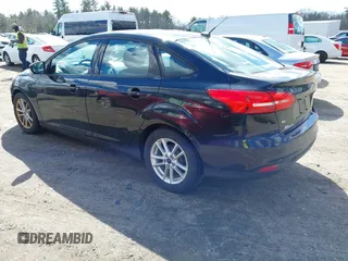 2016 Ford Focus SE with VIN 1FADP3F24GL248175, listed as a IAAI auction lot 41867019 with 135,471 mi miles. Bid and sale history available at carsss.com. Image 3.