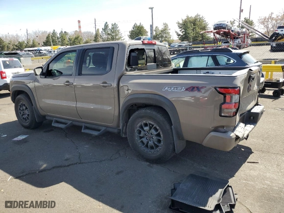 2023 Nissan Frontier PRO-4X with VIN 1N6ED1EK2PN634253, listed as a Copart auction lot 48523695 with 28,138 mi miles and Salvage Title. Bid and sale history available at carsss.com. Image 2.