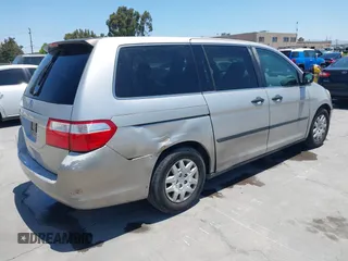 2007 Honda Odyssey LX z VIN 5FNRL38217B016001, wystawiony jako IAAI lot #42603816 z przebiegiem 209 630 mil mil oraz . Historia ofert i sprzedaży dostępna na DreamBid. Obrazek 4.