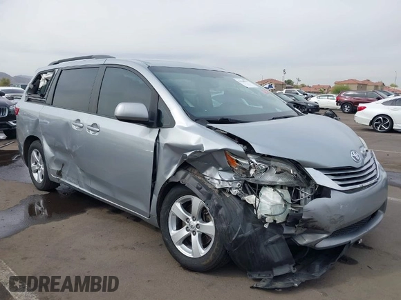 2015 Toyota Sienna LE AAS with VIN 5TDKK3DC6FS627672, listed as a IAAI auction lot 41900555 with 205,111 mi miles. Bid and sale history available at carsss.com. Image 1.