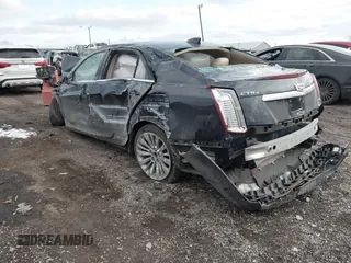 2016 Cadillac CTS Luxury Collection AWD with VIN 1G6AX5SX5G0180953, listed as a IAAI auction lot 41005332 with Not Provided miles and . Bid and sale history available at DreamBid. Image 3.