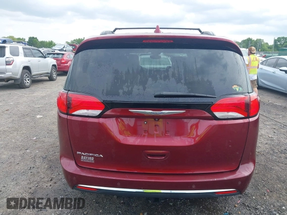 2017 Chrysler Pacifica Touring L z VIN 2C4RC1BG0HR702383, wystawiony jako IAAI lot #42124646 z przebiegiem 141 704 mil mil oraz . Historia ofert i sprzedaży dostępna na DreamBid. Obrazek 16.