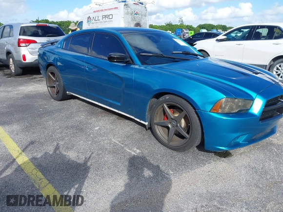 2012 Dodge Charger SXT with VIN 2C3CDXHG0CH185859, listed as a IAAI auction lot 40816799 with 132,572 mi miles. Bid and sale history available at carsss.com. Image 1.