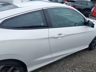 2018 Honda Civic Si z VIN 2HGFC3A52JH751998, wystawiony jako IAAI lot #42415499 z przebiegiem 58 088 mil mil oraz . Historia ofert i sprzedaży dostępna na DreamBid. Obrazek 13.