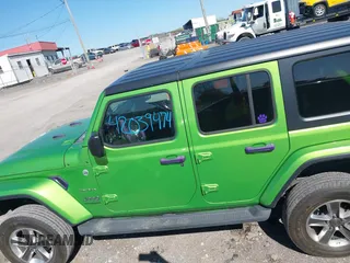 2019 Jeep Wrangler Unlimited Sahara with VIN 1C4HJXEN1KW592876, listed as a IAAI auction lot 42039474 with 66,506 mi miles and . Bid and sale history available at DreamBid. Image 15.