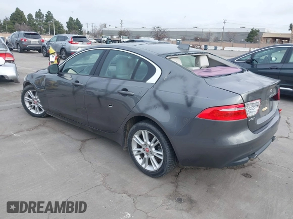 2017 Jaguar XE 25t Premium with VIN SAJAD4BG0HA975017, listed as a IAAI auction lot 41589536 with 40,136 mi miles. Bid and sale history available at carsss.com. Image 3.