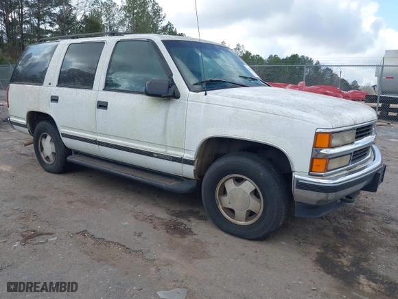 1996 Chevrolet Tahoe with VIN 1GNEK13R9TJ409605, listed as a IAAI auction lot 41467333 with 209,356 mi miles. Bid and sale history available at carsss.com. Image 1.