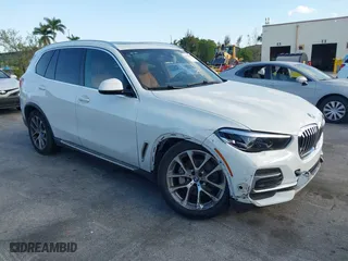 2023 BMW X5 sDrive40i with VIN 5UXCR4C04P9P49975, listed as a IAAI auction lot 41711497 with 49,070 mi miles. Bid and sale history available at carsss.com. Image 1.