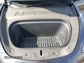2024 Tesla Model Y Long Range z VIN 7SAYGAEE0RF021084, wystawiony jako Copart lot #51973285 z przebiegiem 25 990 mil mil oraz Szkoda całkowita • Salvage title. Historia ofert i sprzedaży dostępna na DreamBid. Obrazek 12.