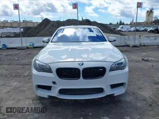 2013 BMW M5 with VIN WBSFV9C56DC772961, listed as a IAAI auction lot 41765457 with 104,568 mi miles. Bid and sale history available at carsss.com. Image 12.