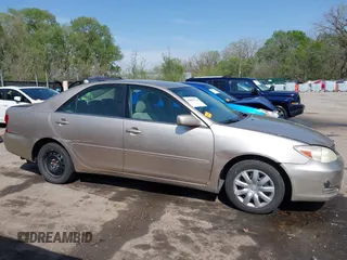 2006 Toyota Camry STD with VIN 4T1BE32K16U680241, listed as a IAAI auction lot 42002721 with 188,867 mi miles. Bid and sale history available at carsss.com. Image 13.