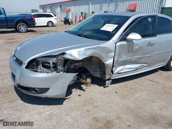 2013 Chevrolet Impala LTZ with VIN 2G1WC5E30D1266641, listed as a IAAI auction lot 39649556 with 148,380 mi miles. Bid and sale history available at carsss.com. Image 6.