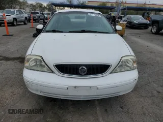 2001 Mercury Sable with VIN 1MEFM53U31A629921, listed as a Copart auction lot 77173754 with 122,769 mi miles and Salvage title. Bid and sale history available at DreamBid. Image 5.