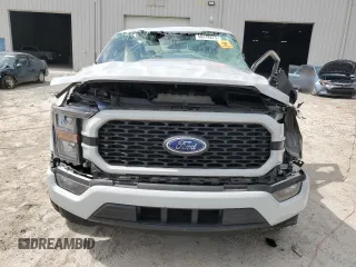 2023 Ford F-150 XL z VIN 1FTEW1CP6PKD50959, wystawiony jako Copart lot #58478275 z przebiegiem Nie podano mil oraz Nie do naprawy • Non repairable. Historia ofert i sprzedaży dostępna na DreamBid. Obrazek 5.