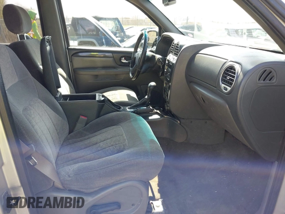 2004 GMC Envoy SLT with VIN 1GKET16S546129810, listed as a IAAI auction lot 42027594 with 143,503 mi miles and . Bid and sale history available at DreamBid. Image 5.