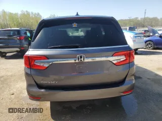2019 Honda Odyssey EX-L with VIN 5FNRL6H77KB040597, listed as a Copart auction lot 53573445 with 110,024 mi miles and Salvage Title. Bid and sale history available at DreamBid. Image 6.