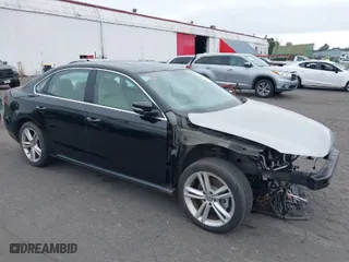 2015 Volkswagen Passat 2.0L TDI SE w/Sunroof with VIN 1VWBV7A34FC012779, listed as a IAAI auction lot 39847433 with 143,949 mi miles. Bid and sale history available at carsss.com. Image 1.