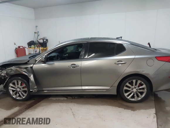 2014 Kia Optima SX Turbo with VIN 5XXGR4A61EG316334, listed as a IAAI auction lot 41684077 with 179,212 mi miles and . Bid and sale history available at DreamBid. Image 14.