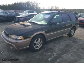1999 Subaru Legacy Wagon Outback with VIN 4S3BG6856X7603852, listed as a IAAI auction lot 41299373 with 168,991 mi miles. Bid and sale history available at carsss.com. Image 2.