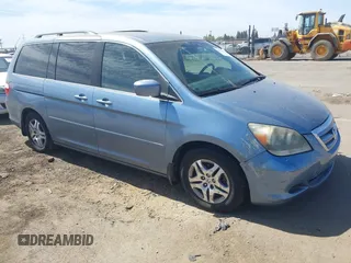 2007 Honda Odyssey EX with VIN 5FNRL38417B091606, listed as a IAAI auction lot 42671861 with 190,291 mi miles and . Bid and sale history available at DreamBid. Image 1.