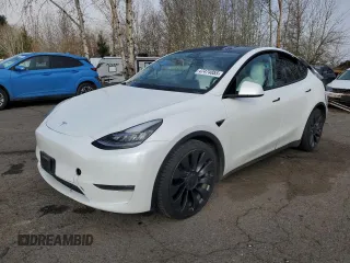 2020 Tesla Model Y Long Range z VIN 5YJYGDEF6LF051768, wystawiony jako Copart lot #47474855 z przebiegiem 69 531 mil mil oraz Szkoda całkowita • Salvage title. Historia ofert i sprzedaży dostępna na DreamBid. Obrazek 1.