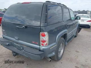 2004 GMC Yukon SLT z VIN 1GKEC13Z44J310511, wystawiony jako IAAI lot #42011475 z przebiegiem 218 746 mil mil oraz . Historia ofert i sprzedaży dostępna na DreamBid. Obrazek 4.