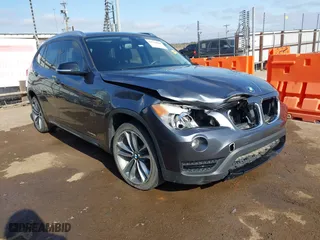 2013 BMW X1 xDrive28i with VIN WBAVL1C54DVR83104, listed as a IAAI auction lot 41918888 with 112,215 mi miles. Bid and sale history available at carsss.com. Image 1.