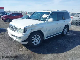2005 Lexus LX 470 with VIN JTJHT00W653551986, listed as a IAAI auction lot 41575221 with 166,287 mi miles. Bid and sale history available at carsss.com. Image 2.