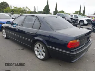 1998 BMW 7 Series with VIN WBAGF8323WDL57406, listed as a IAAI auction lot 42428227 with 93,448 mi miles and . Bid and sale history available at DreamBid. Image 3.