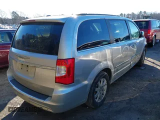 2011 Chrysler Town & Country Touring L with VIN 2A4RR8DGXBR714238, listed as a IAAI auction lot 41283027 with 205,498 mi miles and . Bid and sale history available at DreamBid. Image 4.