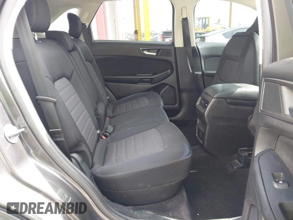 2017 Ford Edge SE z VIN 2FMPK3G97HBC65342, wystawiony jako IAAI lot #42610031 z przebiegiem 103 521 mil mil oraz . Historia ofert i sprzedaży dostępna na DreamBid. Obrazek 8.