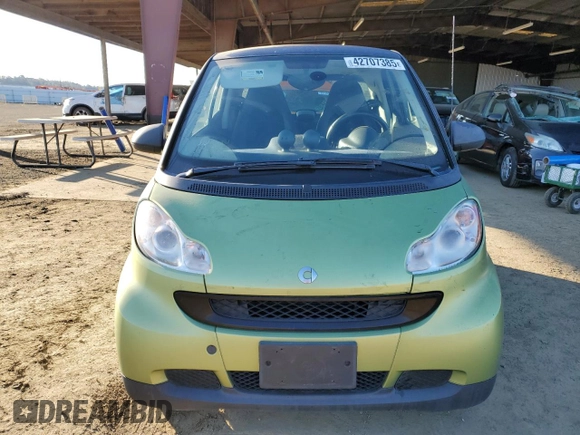 2012 Smart fortwo Pure z VIN WMEEJ3BA7CK543415, wystawiony jako Copart lot #42707385 z przebiegiem 76 280 mil mil oraz Szkody całkowita. Historia ofert i sprzedaży dostępna na DreamBid. Obrazek 5.