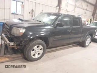 2009 Toyota Tacoma with VIN 3TMMU52N69M011591, listed as a IAAI auction lot 41941044 with 220,925 mi miles and . Bid and sale history available at DreamBid. Image 2.