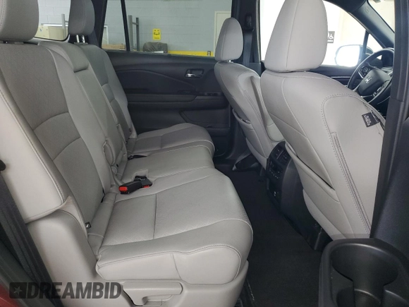 2020 Honda Passport Touring with VIN 5FNYF8H90LB018300, listed as a Copart auction lot 63437595 with 27,740 mi miles and Salvage title. Bid and sale history available at DreamBid. Image 11.