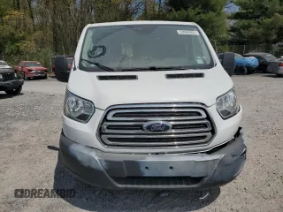 2016 Ford Transit Cargo with VIN 1FTYR1ZM6GKA87504, listed as a Copart auction lot 53095005 with 56,514 mi miles and Salvage Title. Bid and sale history available at carsss.com. Image 5.