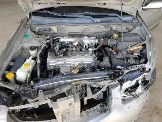 2005 Nissan Sentra 1.8 with VIN 3N1CB51D25L584002, listed as a Copart auction lot 81814474 with Not Provided miles and Salvage Title. Bid and sale history available at DreamBid. Image 12.