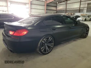 2016 BMW M6 z VIN WBS6E9C53GGF92658, wystawiony jako Copart lot #79003953 z przebiegiem 49 231 mil mil oraz . Historia ofert i sprzedaży dostępna na DreamBid. Obrazek 3.