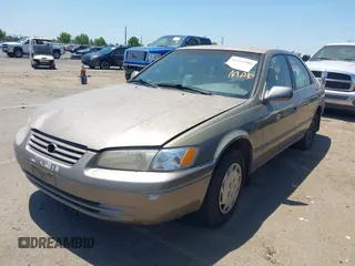 1999 Toyota Camry LE z VIN JT2BG22KXX0317947, wystawiony jako IAAI lot #42352594 z przebiegiem 192 160 mil mil oraz . Historia ofert i sprzedaży dostępna na DreamBid. Obrazek 2.