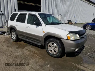 2003 Mazda Tribute LX with VIN 4F2CZ94133KM19916, listed as a Copart auction lot 73718284 with 151,644 mi miles and Salvage Title. Bid and sale history available at carsss.com. Image 4.
