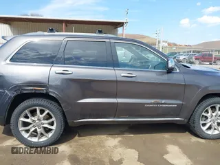 2014 Jeep Grand Cherokee Summit with VIN 1C4RJFJM5EC377129, listed as a IAAI auction lot 41763932 with 187,561 mi miles and . Bid and sale history available at DreamBid. Image 6.