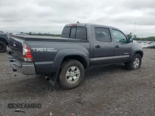 2015 Toyota Tacoma with VIN 3TMLU4EN6FM203591, listed as a Copart auction lot 58518185 with 149,729 mi miles and Salvage title. Bid and sale history available at DreamBid. Image 3.