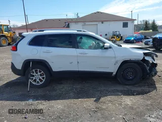 2014 Jeep Cherokee Latitude with VIN 1C4PJMCS8EW192482, listed as a IAAI auction lot 41994546 with 116,839 mi miles and . Bid and sale history available at carsss.com. Image 13.