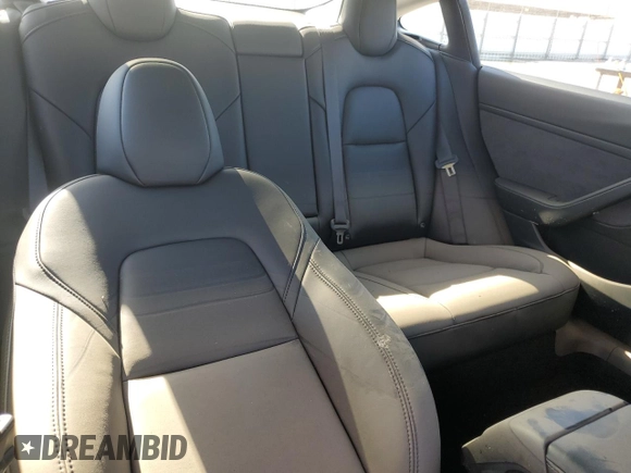 2023 Tesla Model 3 z VIN 5YJ3E1EA6PF649934, wystawiony jako Copart lot #47597395 z przebiegiem Nie podano mil oraz Szkoda całkowita • Salvage title. Historia ofert i sprzedaży dostępna na DreamBid. Obrazek 10.