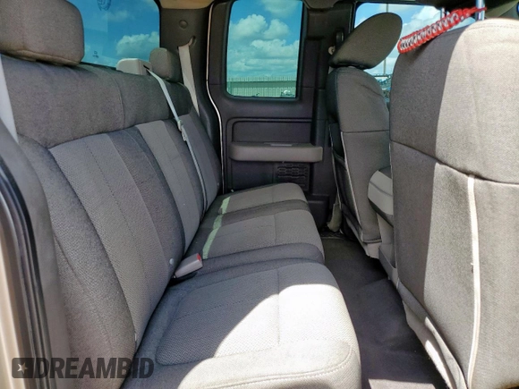 2009 Ford F-150 STX with VIN 1FTRX12W79KC78227, listed as a Copart auction lot 62272975 with 189,516 mi miles and Salvage title. Bid and sale history available at DreamBid. Image 10.