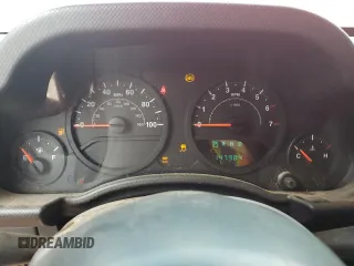 2007 Jeep Wrangler X with VIN 1J4FA24197L185416, listed as a Copart auction lot 59943735 with 147,984 mi miles and Salvage title. Bid and sale history available at DreamBid. Image 9.