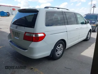 2007 Honda Odyssey EX-L with VIN 5FNRL38787B144585, listed as a IAAI auction lot 42139957 with 211,412 mi miles and . Bid and sale history available at DreamBid. Image 4.