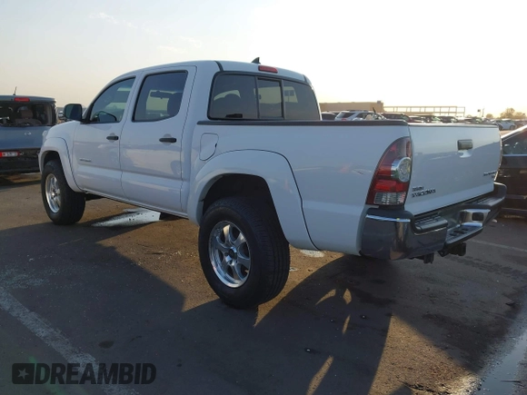 2014 Toyota Tacoma PreRunner with VIN 3TMJU4GN3EM160587, listed as a IAAI auction lot 42710985 with 200,867 mi miles and . Bid and sale history available at DreamBid. Image 6.
