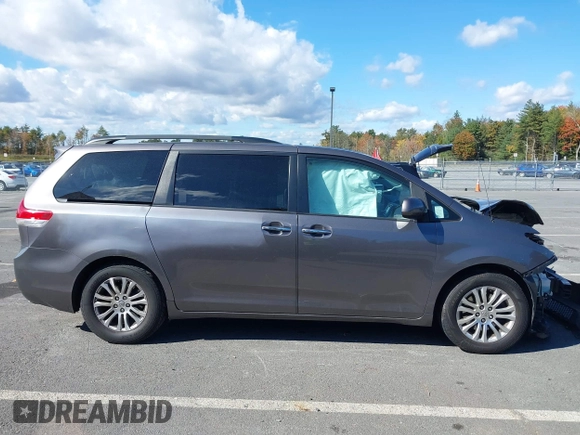 2014 Toyota Sienna XLE with VIN 5TDYK3DC1ES472036, listed as a IAAI auction lot 40546573 with 134,907 mi miles and . Bid and sale history available at DreamBid. Image 14.